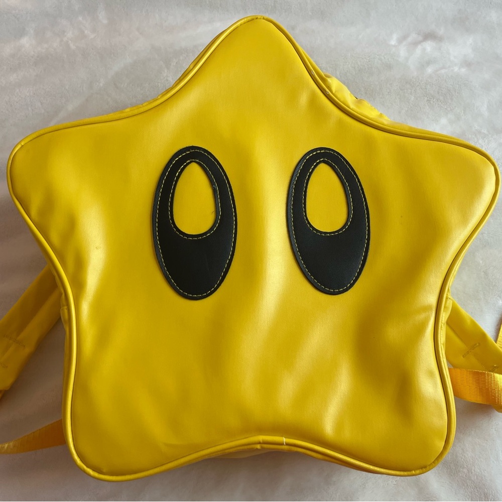 Yellow Star Backpack with Black Accents